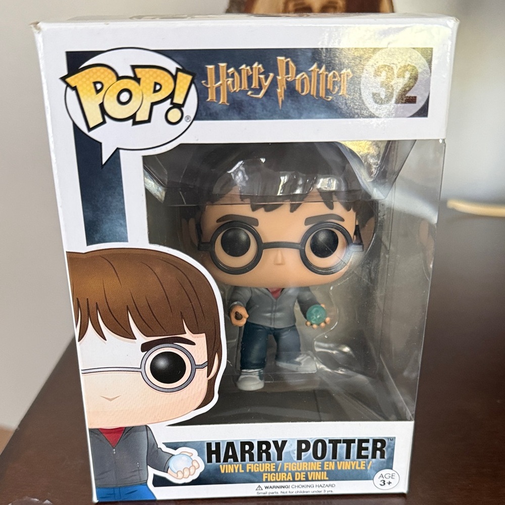 Funko Pop! Harry Potter Vinyl Figure #32 - Black Hair, Gray Jacket, Blue Orb